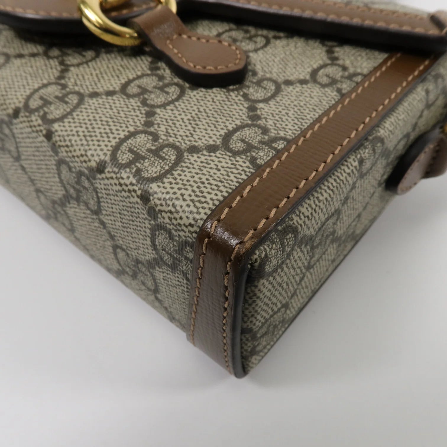 GUCCI Horsebit 1955
Mini Shoulder Bag in Brown GG Supreme