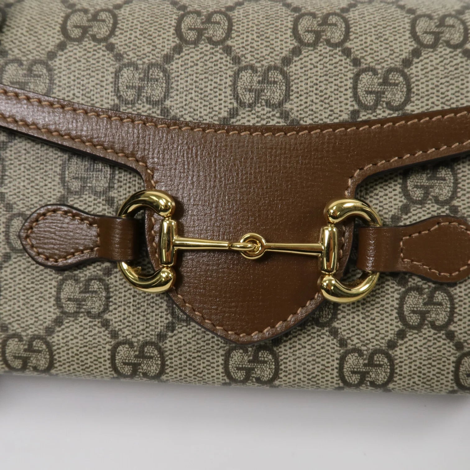 GUCCI Horsebit 1955
Mini Shoulder Bag in Brown GG Supreme