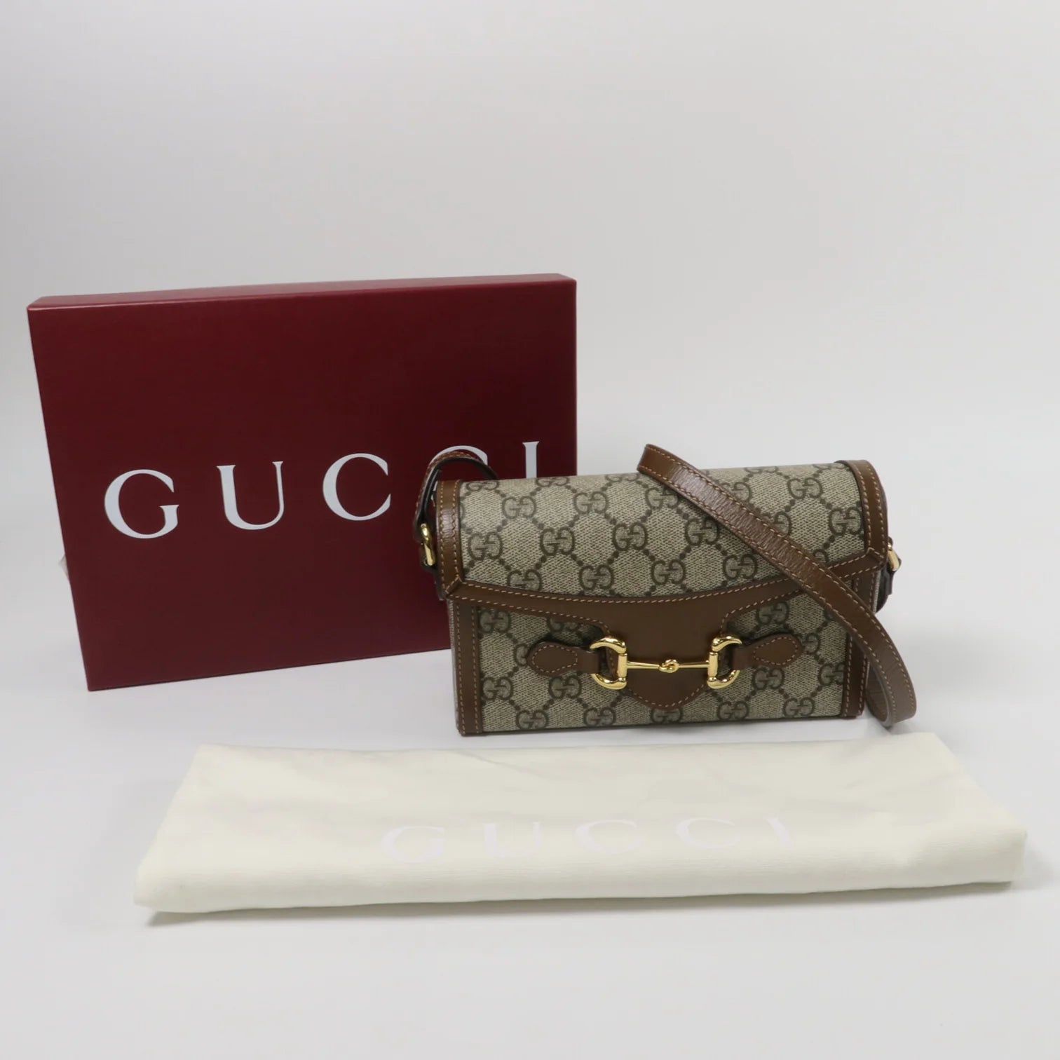 GUCCI Horsebit 1955
Mini Shoulder Bag in Brown GG Supreme