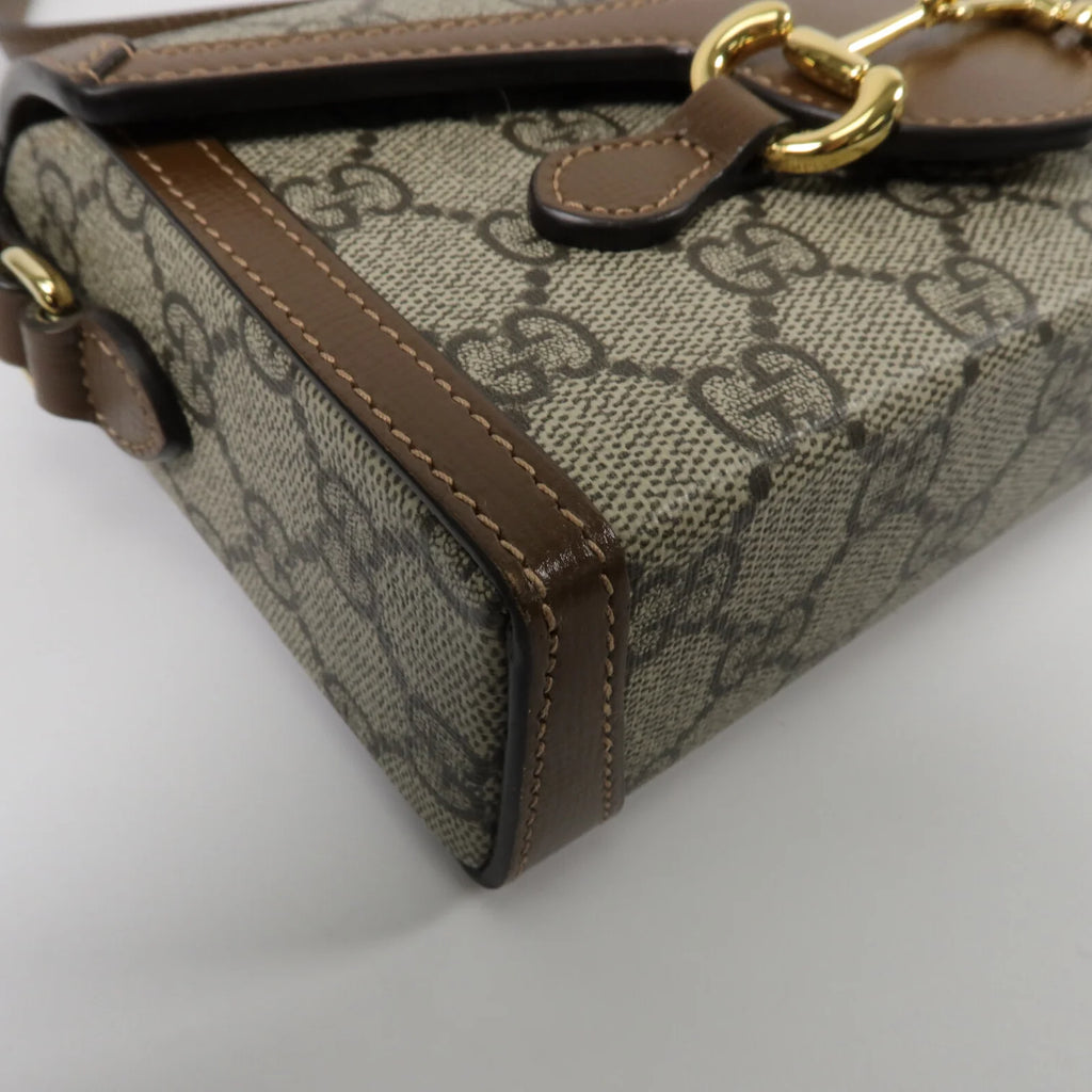 GUCCI Horsebit 1955
Mini Shoulder Bag in Brown GG Supreme