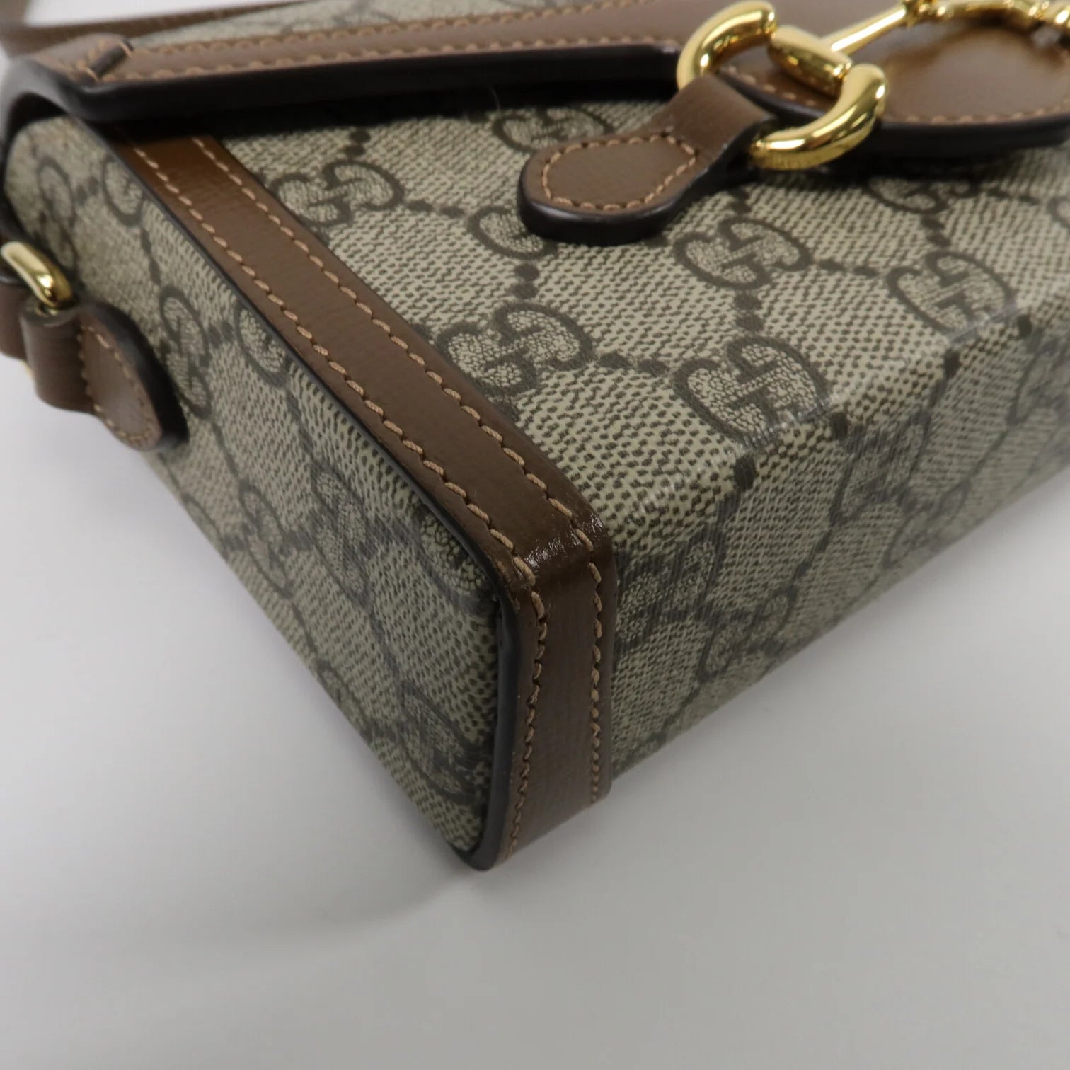 GUCCI Horsebit 1955
Mini Shoulder Bag in Brown GG Supreme